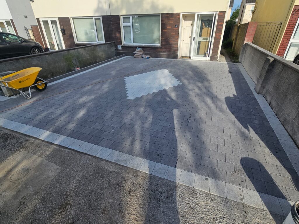 New Driveway with black corrib and silver granite borders with diamond silver granite in the centre piece